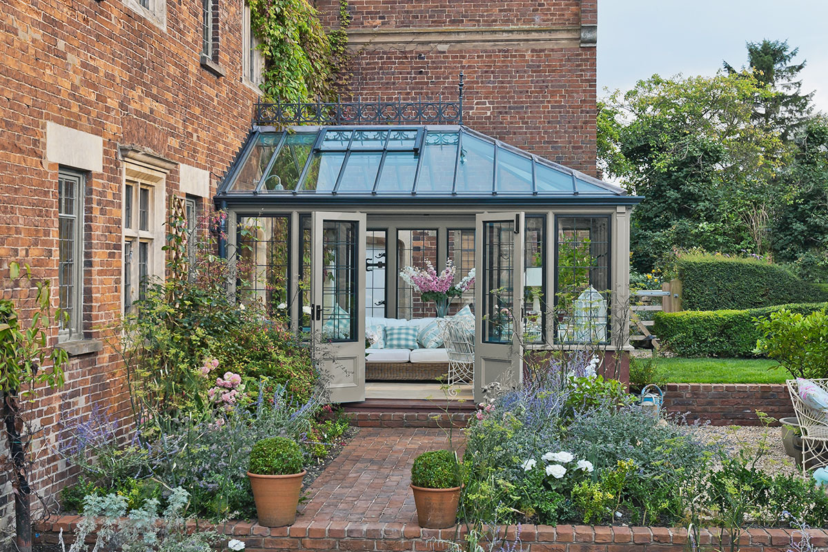 hipped conservatory with metal windows