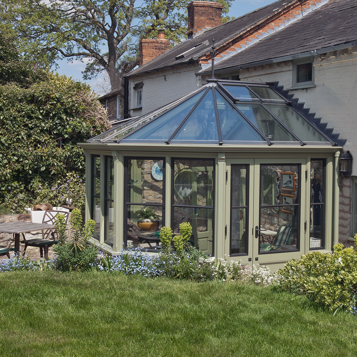 Small conservatory with metal windows