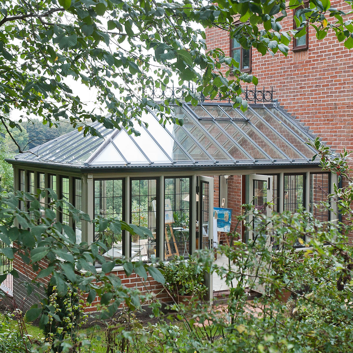 Hipped conservatory with metal windows