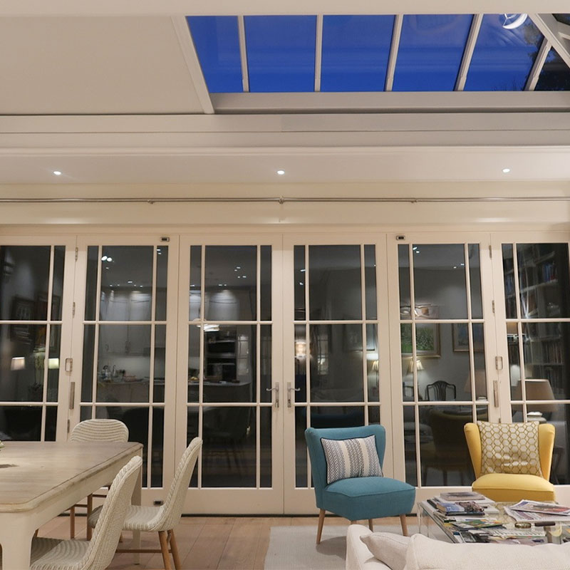 Sunroom at night with blinds closed